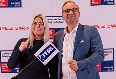 A man and woman smiling for a photo