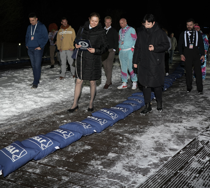 Guinness World Records adjudicator inspects the pillow line