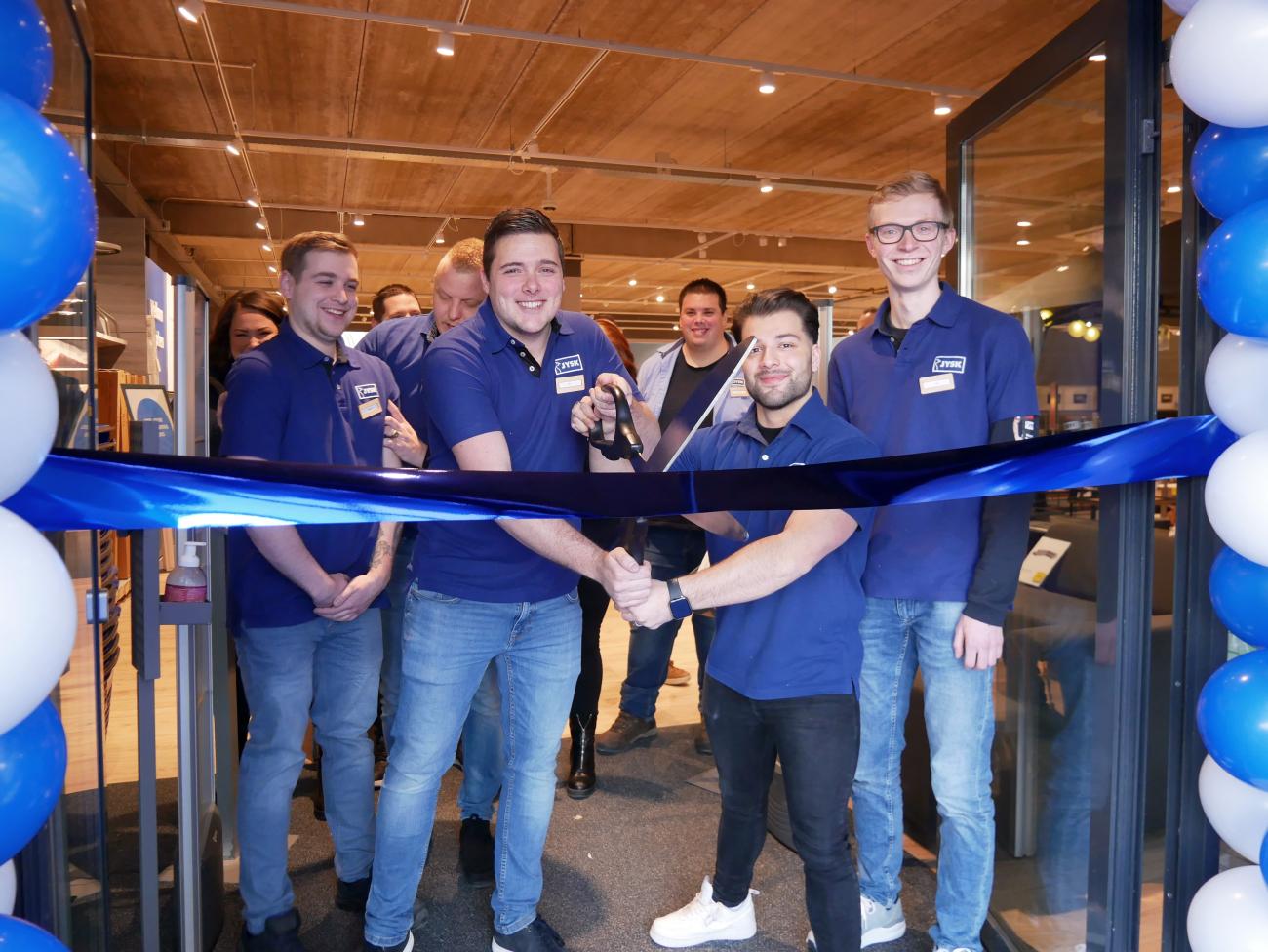 Lachende gezichten bij de heropening.