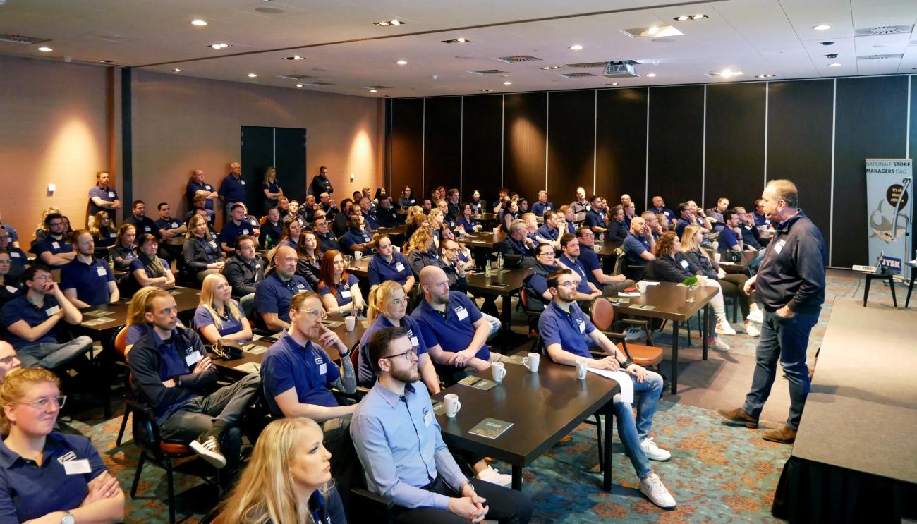 Een volle zaal bij de aftrap van de SM Meeting